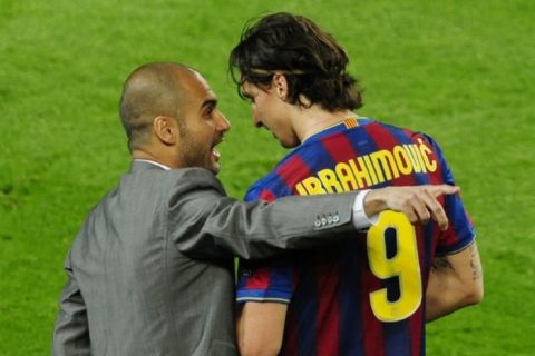 FC Barcelona's Zlatan Ibrahimovic of Sweden, right talks with his coach Pep Guardiola, during the Champions League semifinal second leg soccer match between FC Barcelona and Inter Milan at the Camp Nou stadium in Barcelona, Spain, Wednesday, April 28, 2010. Inter lost the match 0-1, but went through to the final 3-2 on aggregate. (AP Photo/Manu Fernandez)