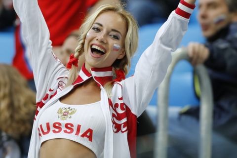 A fan of Russia shouts prior to the group A match between Russia and Egypt at the 2018 soccer World Cup in the St. Petersburg stadium in St. Petersburg, Russia, Tuesday, June 19, 2018.(AP Photo/Efrem Lukatsky)