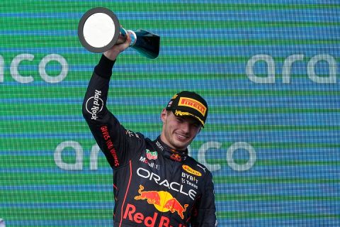 Red Bull driver Max Verstappen, of the Netherlands, raises his trophy after winning the Formula One U.S. Grand Prix auto race at Circuit of the Americas, Sunday, Oct. 23, 2022, in Austin, Texas. (AP Photo/Charlie Neibergall)