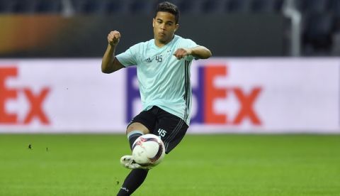 Ajax's Justin Kluivert kicks a ball during a training session at the Friends Arena in Stockholm, Sweden, Tuesday, May 23, 2017. Ajax Amsterdam and Manchester United will play the soccer Europa League final in Stockholm on Wednesday, May 24. (AP Photo/Martin Meissner)