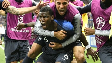 France's Paul Pogba celebrates after scoring his side's third goal during the final match between France and Croatia at the 2018 soccer World Cup in the Luzhniki Stadium in Moscow, Russia, Sunday, July 15, 2018. (AP Photo/Martin Meissner)