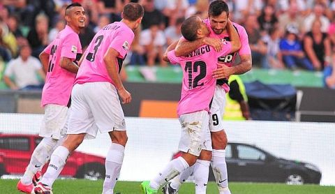 Juventus' Italian forward Sebastian Giovinco (2nd R) celebrates with Montenegrin teammate Mirko Vucinic (R) after scoring during the Italian Serie A football match between Udinese and Juventus at the "Stadio Friuli" in Udine on September 02, 2012. AFP PHOTO / GIUSEPPE CACACE
