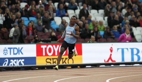 Botswana's Isaac Makwala races alone on the track in a Men's 200m individual time trial during the World Athletics Championships in London Wednesday, Aug. 9, 2017. Makwala ran an individual time trial to qualify for the 200m semi-finals after he missed the 200m heats and the 400m final as he was barred from competing for 48 hours while organisers tried to halt a norovirus outbreak. (AP Photo/Kirsty Wigglesworth)