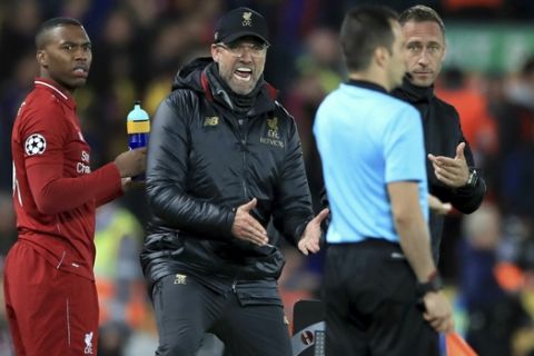 Liverpool manager Jurgen Klopp gestures on the touchline during the Champions League Semi Final, second leg soccer match between Liverpool and Barcelona at Anfield, Liverpool, England, Tuesday, May 7, 2019. Liverpool won the match 4-0 to overturn a three-goal deficit to win the match 4-3 on aggregate. (Peter Byrne/PA via AP)