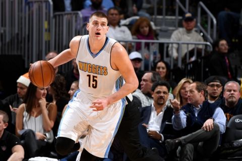 DENVER, CO - JANUARY 26: Nikola Jokic #15 of the Denver Nuggets handles the ball during the game against the Phoenix Suns on January 26, 2017 at the Pepsi Center in Denver, Colorado. NOTE TO USER: User expressly acknowledges and agrees that, by downloading and/or using this Photograph, user is consenting to the terms and conditions of the Getty Images License Agreement. Mandatory Copyright Notice: Copyright 2017 NBAE (Photo by Garrett Ellwood/NBAE via Getty Images)