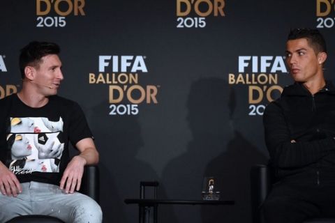 (From L) FC Barcelona and Argentina's forward Lionel Messi and Real Madrid and Portugal's forward Cristiano Ronaldo give a press conference ahead of the 2015 FIFA Ballon d'Or award ceremony at the Kongresshaus in Zurich on January 11, 2016.   AFP PHOTO / OLIVIER MORIN / AFP / OLIVIER MORIN        (Photo credit should read OLIVIER MORIN/AFP/Getty Images)