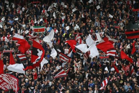 Ajax fans cheer for their team during the first leg semi final soccer match between Ajax and Olympique Lyon in the Amsterdam ArenA stadium, Netherlands, Wednesday, May 3, 2017. (AP Photo/Peter Dejong)