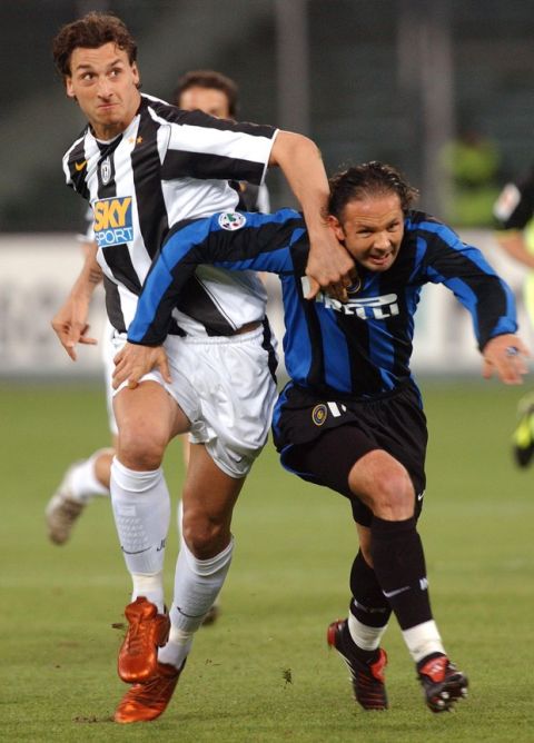 Juventus Zlatan Ibrahimovic from Sweden, left, and Inter Milan's Sinisa Mihajlovic from Serbia challenge for the ballduring the Italian first division soccer league match between Juventus and Inter Milan at the Delle Alpi stadium in Turin, Italy, Wednesday, April 20, 2005. Juventus lost 0-1. (AP Photo/Massimo Pinca)
