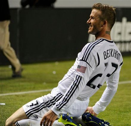 Los Angeles Galaxy midfielder David Beckham (23) celebrates after scoring a goal against the Portland Timbers in the second half of an MLS soccer game in Carson, Calif., Saturday, April 14, 2012. The Galaxy won 3-1.(AP Photo/Lori Shepler)