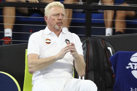 Team captain Boris Becker of Germany watches during his match against Nick Kyrgios of Australia at the ATP Cup tennis tournament in Brisbane, Australia, Friday, Jan. 3, 2020. (AP Photo/Tertius Pickard)