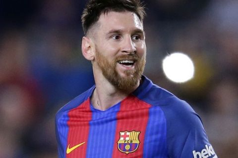 FC Barcelona's Lionel Messi reacts during the Spanish La Liga soccer match between FC Barcelona and Valencia at the Camp Nou stadium in Barcelona, Spain, Sunday, March 19, 2017. (AP Photo/Manu Fernandez)