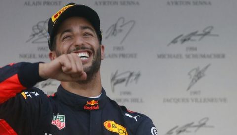 Red Bull driver Daniel Ricciardo of Australia celebrates on the podium after winning the Formula One Azerbaijan Grand Prix in Baku, Azerbaijan, Sunday, June 25, 2017. (AP Photo/Darko Bandic)