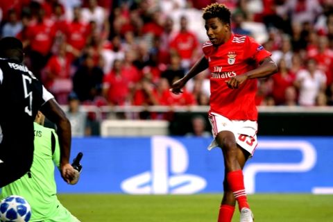 Benfica's Gedson Fernandes, right, scores a goal that was disallowed for an offside position during the Champions League playoffs, first leg, soccer match between Benfica and PAOK at the Luz stadium in Lisbon, Tuesday, Aug. 21, 2018. (AP Photo/Armando Franca)