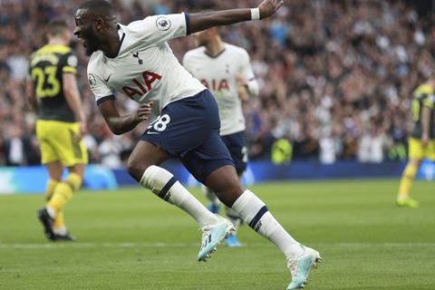 Tottenham's Tanguy Ndombele celebrates scoring his side's first goal during the English Premier League soccer match between Tottenham Hotspur and Southampton at the White Heart Lane stadium in London, Saturday, Sept. 28, 2019. (AP Photo/Ian Walton)