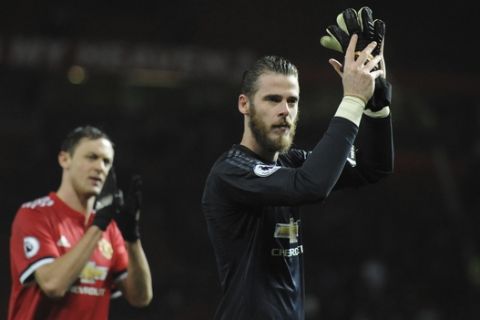 Manchester United's goalkeeper David de Gea applauds the fans as he walks from the pitch after the end of the English Premier League soccer match between Manchester United and Stoke City at Old Trafford in Manchester, England, Monday, Jan. 15, 2018. United won the game 3-0. (AP Photo/Rui Vieira)