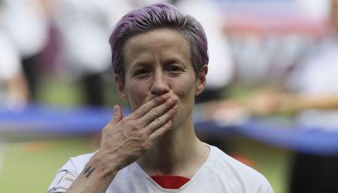 United States' Megan Rapinoe greets supporters ahead of the Women's World Cup final soccer match between US and The Netherlands at the Stade de Lyon in Decines, outside Lyon, France, Sunday, July 7, 2019. (AP Photo/David Vincent)