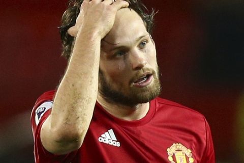 Manchester United's Daley Blind leaves the field after a 0-0 draw during the English Premier League soccer match between Manchester United and Hull City at Old Trafford in Manchester, England, Wednesday, Feb. 1, 2017. (AP Photo/Dave Thompson)