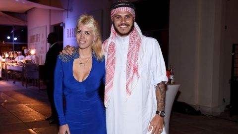 DOHA, QATAR - JANUARY 01:  Mauro Icardi (R) and  Wanda Nara pose for a photo during the FC Internazionale party at Hotel St Regis on January 1, 2016 in Doha, Qatar.  (Photo by Claudio Villa - Inter/Inter via Getty Images)