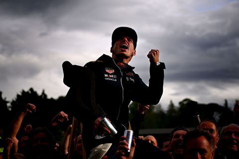 IMOLA, ITALY - APRIL 24: Race winner Max Verstappen of the Netherlands and Oracle Red Bull Racing celebrates with his team after the F1 Grand Prix of Emilia Romagna at Autodromo Enzo e Dino Ferrari on April 24, 2022 in Imola, Italy. (Photo by Clive Mason/Getty Images)