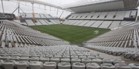 A general view of the still unfinished Itaquerao stadium in Sao Paulo, Brazil, Tuesday, April 15, 2014. The stadium that will host the World Cup opener match between Brazil and Croatia on June 12, will hold nearly 70,000 people in the opener, but after the World Cup its capacity will be reduced to about 45,000. (AP Photo/Andre Penner) ORG XMIT: XAP105