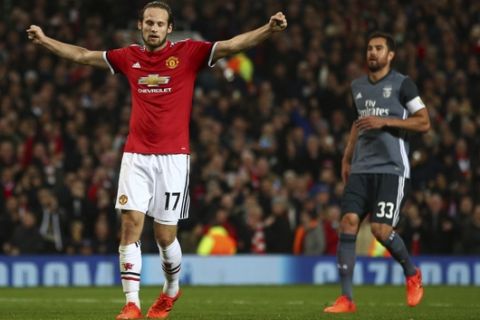 Manchester United's Daley Blind celebrates after scoring his side's second goal during the Champions League group A soccer match between Manchester United and Benfica, at Old Trafford, in Manchester, England, Tuesday, Oct. 31, 2017. (AP Photo/Dave Thompson)