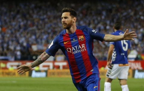 Barcelona's Lionel Messi celebrates after scoring a goal during the Copa del Rey final soccer match between Barcelona and Alaves at the Vicente Calderon stadium in Madrid, Spain, Saturday May 27, 2017. (AP Photo/Daniel Ochoa de Olza)