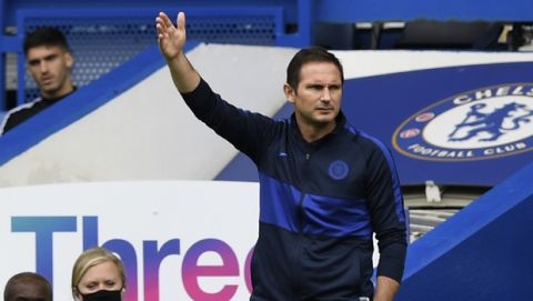 Chelsea's head coach Frank Lampard gestures during the English Premier League soccer match between Chelsea and Wolverhampton Wanderers at Stamford Bridge, in London, Sunday July 26, 2020. (Daniel Leal-Olivas/Pool via AP)