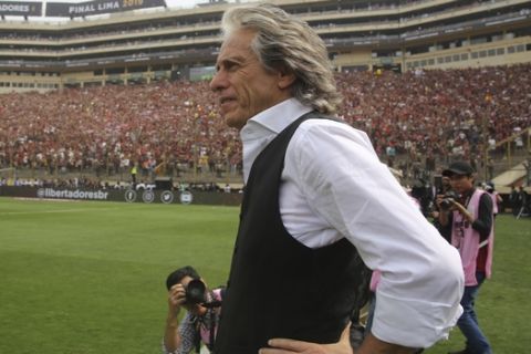 Jorge Jesus, coach of Brazil's Flamengo, stands prior to the start of the Copa Libertadores final soccer match against Argentina's River Plate at the Monumental stadium in Lima, Peru, Saturday, Nov. 23, 2019. (AP Photo/Martin Mejia)