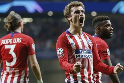 Atletico forward Antoine Griezmann, reacts after he scored his side second goal during a Group A Champions League soccer match between Atletico Madrid and Club Brugge at the Wanda Metropolitano stadium in Madrid, Spain, Wednesday Oct. 3, 2018. (AP Photo/Paul White)