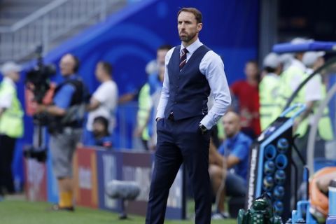 England head coach Gareth Southgate stands during the quarterfinal match between Sweden and England at the 2018 soccer World Cup in the Samara Arena, in Samara, Russia, Saturday, July 7, 2018. (AP Photo/Alastair Grant)