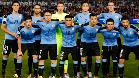 Uruguay's players pose for a team picture before a World Cup qualifying match against Paraguay in Asuncion, Paraguay, Tuesday, Sept. 5, 2017.(AP Photo/Jorge Saenz)