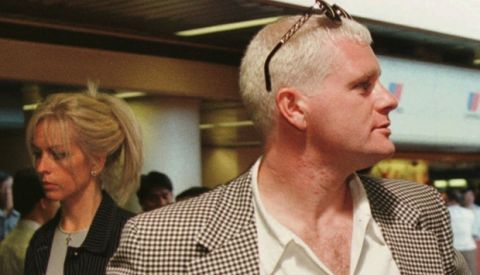 Soccer star Paul Gascoigne and his new wife Sheryl, background, arrive at San Francisco International Airport from London, Tuesday July 2, 1996 in San Francisco. Gascoigne is reportedly on his way to Hawaii for his honeymoon.(AP Photo/George Nikitin)