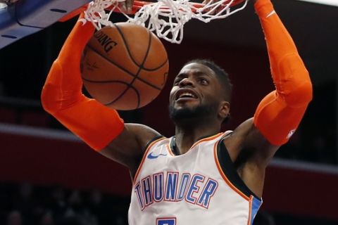 Oklahoma City Thunder forward Nerlens Noel dunks during the second half of an NBA basketball game against the Detroit Pistons, Monday, Dec. 3, 2018, in Detroit. (AP Photo/Carlos Osorio)
