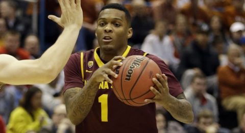 Arizona State guard Jahii Carson (1) drives the ball during the second half of a second-round game against the Texas in the NCAA college basketball tournament Thursday, March 20, 2014, in Milwaukee. (AP Photo/Jeffrey Phelps) 