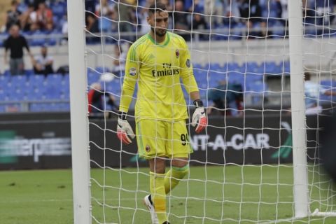 AC Milan goalkeeper Gianluigi Donnarumma reacts after Lazio's Ciro Immobile scored during a Serie A soccer match between Lazio and AC Milan, at the Rome Olympic stadium, Sunday, Sept. 10, 2017. (AP Photo/Alessandra Tarantino)