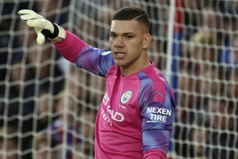 Manchester City's goalkeeper Ederson during the English Premier League soccer match between Crystal Palace and Manchester City at Selhurst Park in London, England, Saturday, Oct. 19, 2019. (AP Photo/Rui Vieira)