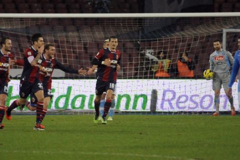 Bologna's Panagiotis Kone, second from left, celebrates after scoring during a Serie A soccer match between Napoli and Bologna, in Naples, Italy, Sunday, Dec. 16, 2012. Bologna won 3-2. (AP Photo/Salvatore Laporta)