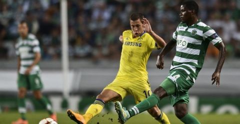 Sporting's midfielder William Silva de Carvalho (R) vies with Chelsea's Belgian midfielder Eden Hazard (L) during the UEFA Champions League Group G football match Sporting CP vs Chelsea FC at Alvalade XXI stadium in Lisbon on September 30, 2014.  AFP PHOTO / PATRICIA DE MELO MOREIRA        (Photo credit should read PATRICIA DE MELO MOREIRA/AFP/Getty Images)