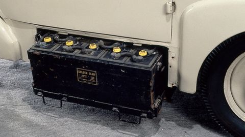 The battery compartment was in the cabin floor of the Tama electric car. There were two such compartments, one on either side. Each battery case was provided with rollers so that used batteries could be quickly exchanged with freshly charged ones. Thanks to such engineering, the Tama took top honors in the performance tests conducted by Japans Ministry of Commerce and Industry.