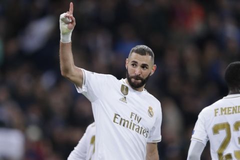 Real Madrid's Karim Benzema celebrates after scoring his side's fifth goal during a Champions League group A soccer match between Real Madrid and Galatasaray at the Santiago Bernabeu stadium in Madrid, Spain, Wednesday, Nov. 6, 2019. (AP Photo/Manu Fernandez)