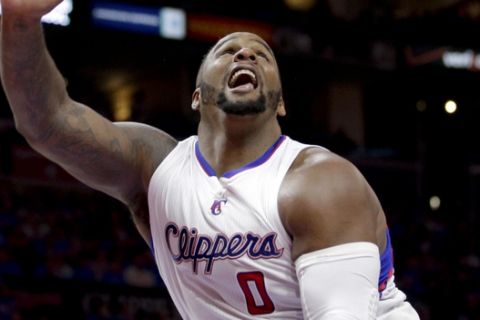 Los Angeles Clippers forward Glen Davis reacts during the first half of Game 3 in a second-round NBA basketball playoff series against the Houston Rockets in Los Angeles, Friday, May 8, 2015. (AP Photo/Jae C. Hong)