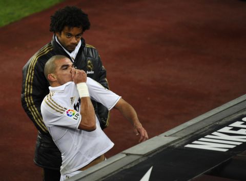 Real Madrid's Portuguese defender Pepe (R) gestures at the end of the second leg of the Spanish Cup quarter-final "El clasico" football match Barcelona vs Real Madrid at the Camp Nou stadium in Barcelona on January 25, 2012. AFP PHOTO/ PIERRE-PHILIPPE MARCOU (Photo credit should read PIERRE-PHILIPPE MARCOU/AFP/Getty Images)