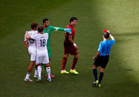 SALVADOR, BRAZIL - JUNE 16: Pepe of Portugal is shown a red card and sent off by referee Milorad Mazic during the 2014 FIFA World Cup Brazil Group G match between Germany and Portugal at Arena Fonte Nova on June 16, 2014 in Salvador, Brazil.  (Photo by Matthew Lewis/Getty Images)