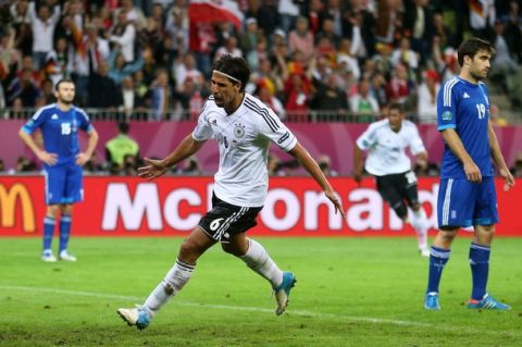 GDANSK, POLAND - JUNE 22:  Sami Khedira of Germany celebrates after scoring Germany's second goal during the UEFA EURO 2012 quarter final match between Germany and Greece at The Municipal Stadium on June 22, 2012 in Gdansk, Poland.  (Photo by Joern Pollex/Getty Images)