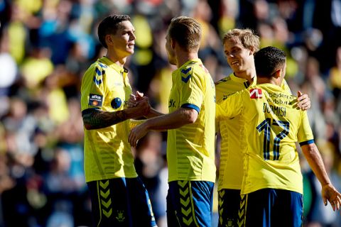 BRONDBY, DENMARK - SEPTEMBER 27: Daniel Agger and Martin Albrechtsen of Brondby IF celebrate their victory after the Danish Alka Superliga match between Brondby IF and FC Copenhagen at Brondby Stadion on September 27, 2015 in Brondby, Denmark. (Photo by Lars Ronbog / FrontZoneSport via Getty Images)
