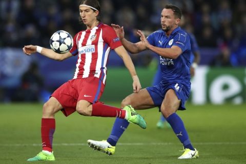 Leicester City's Daniel Drinkwater, right, and Atletico Madrid's Kasmirski Filipe Luis in action during the second leg of the UEFA Champions League quarter final soccer match at the King Power Stadium in Leicester, Tuesday April 18, 2017. (Nick Potts/PA via AP)