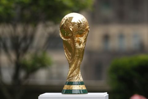 2026 FIFA World Cup Trophy on display before press conference at Rockefeller Plaza. Thursday, June 16, 2022, in New York. (AP Photo/Noah K. Murray)