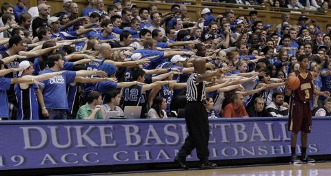 Duke fans cheer as Shaw's Derrick Hunter (3) prepares to inbound the ball during the second half of an NCAA exhibition college basketball game in Durham, N.C., Wednesday, Nov. 2, 2011. Duke won 80-66. (AP Photo/Gerry Broome)