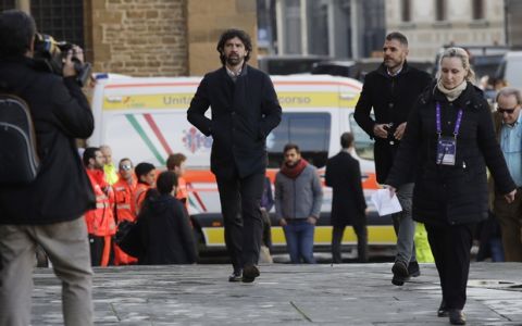 Italian soccer players association president Damiano Tommasi arrives for the funeral ceremony of Italian player Davide Astori in Florence, Italy, Thursday, March 8, 2018. The 31-year-old Astori was found dead in his hotel room on Sunday after a suspected cardiac arrest before his team was set to play an Italian league match at Udinese. (AP Photo/Alessandra Tarantino)