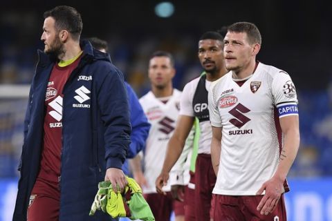 Torino's Andrea Belotti, right, reacts after Napoli wins a Serie A soccer match between Napoli and Torino at the San Paolo Stadium in Naples, Italy, Saturday, Feb. 29, 2020. (Cafaro/LaPresse via AP)